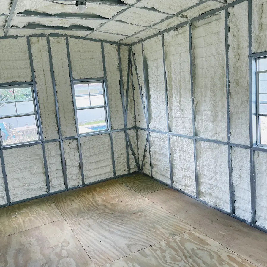 Closed-cell spray foam insulation applied to wall cavities in a residential project in Lincolnia
